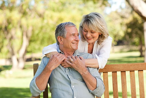 A couple sharing a quiet moment together in a garden